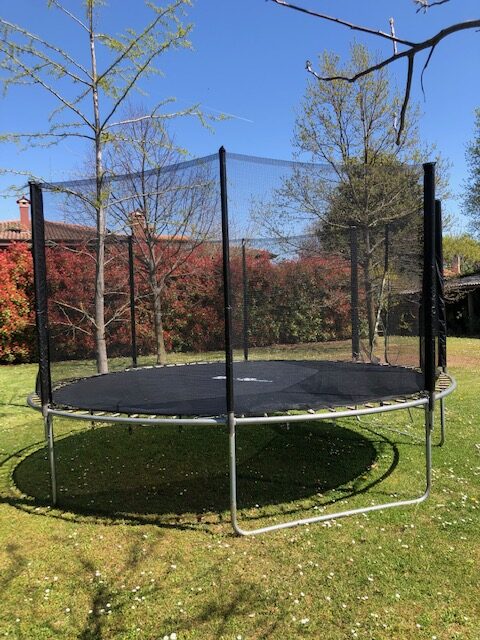 Trampolino elastico per bambini con rete di protezione